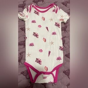 Kyte Baby body suit in “shell” pattern. EUC.